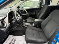 The 2017 Toyota RAV4 Hybrid XLE in a stunning blue finish offers exceptional control with its AWD dr... (image 8)