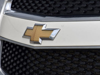 The 2014 Chevrolet Equinox LT AWD in a crisp white finish is a versatile and capable SUV designed to... (image 9)