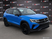 The 2024 Volkswagen Taos Comfortline Black Edition AWD blends turbocharged performance with bold bla... (image 7)