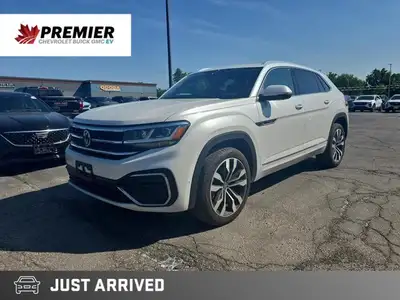 Command the road in this sleek 2023 Volkswagen Atlas Cross Sport Execline. This pristine Oryx White...