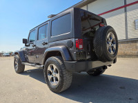 6 Speed manual transmission Jeep Sahara upgraded with Lift Kit, 33" Falken Wildpeak All Terrain tire... (image 4)