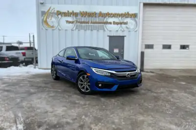 2018 Honda Civic Coupe Touring FWD Call or text us at 306-380-6163 to schedule a test drive or learn...