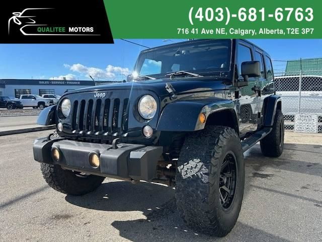 2014 Jeep Wrangler Unlimited 4WD 4dr Sahara in Cars & Trucks in Calgary