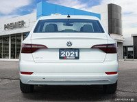 This 2021 Volkswagen Jetta Highline shines with its sleek Pure White exterior and luxurious Titan Bl... (image 4)