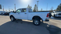 This 2024 RAM 2500 TRADESMAN CREW CAB 4X4 has the following options Cloth 40/20/40 Bench Seat, Uconn... (image 6)