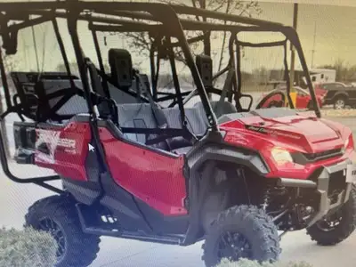 The 2025 Honda Pioneer 1000-5 Deluxe (SXS10M5DS) is a 5-seater side-by-side utility vehicle with a 9...