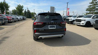 This Ford Escape is equipped with: Cloth Seats Trim, Radio: AM/FM Stereo w/SiriusXM, 8 Inch Touchscr... (image 7)