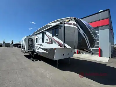 Sabre FW w/Quad Slidouts, Rear Entertainment w/Full Wall Ent. Center & Electric Lift TV, Sofa Slideo...