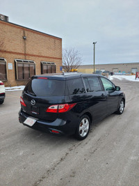 This stylish 2016 Mazda MAZDA5 Touring is a reliable and spacious wagon that's perfect for your dail... (image 3)