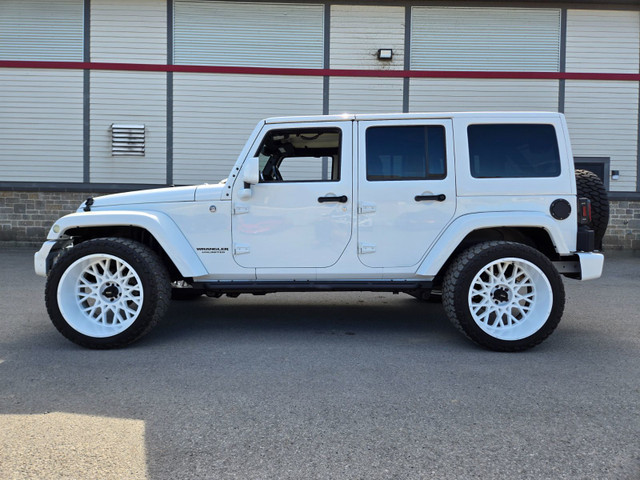 2015 Jeep Wrangler Unlimited UNIQUE LOOK / 22X14 WHEELS TRIPLE B in Cars & Trucks in West Island - Image 4