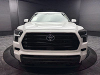 The elegance of White paired with a stately Black interior, the 2024 Toyota Sequoia TRD Off-Road awa... (image 8)