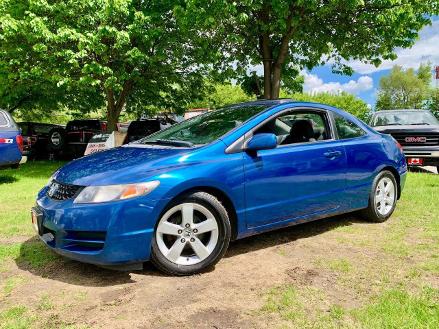 2010 HONDA CIVIC COUPE 5 SPEED LOW KMS in Cars & Trucks in Guelph
