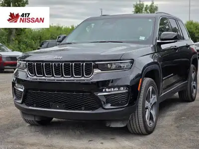This 2022 Jeep Grand Cherokee 4xe, presented in a menacing and sophisticated *Black* finish, represe...