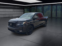 A rugged yet refined crew cab pickup with all-wheel drive and a 5.25 ft. box. The Black Edition incl... (image 3)