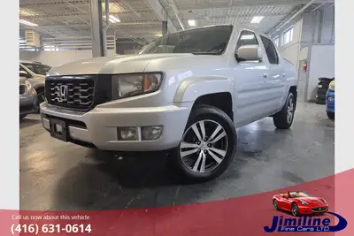 JUST TRADED IN AT A DEALER STORE. NICE CLEAN RIDGE LINE SPECIAL EDITION FOR THE YEAR AND KILOMETERS....