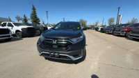 This Honda CR-V is equipped with: Leatherette/Fabric Seating Surfaces, Power moonroof, Heated front... (image 3)