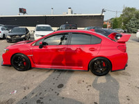 All vehicles come with a full vehicle History Report, ask to see it! 2017 Subaru Impreza WRXSTI feat... (image 6)