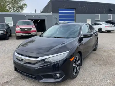 2016 Honda Civic touring comes with Push button, Navigation, backup cameras, sunroof, heated seats,...