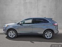 This 2024 Ford Edge Titanium AWD, presented in a sophisticated *Gray* finish, offers a compelling bl... (image 7)