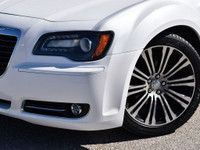 Slide into the sleek and sophisticated 2013 Chrysler 300S 3.6L, a sedan thats all about blending lux... (image 1)