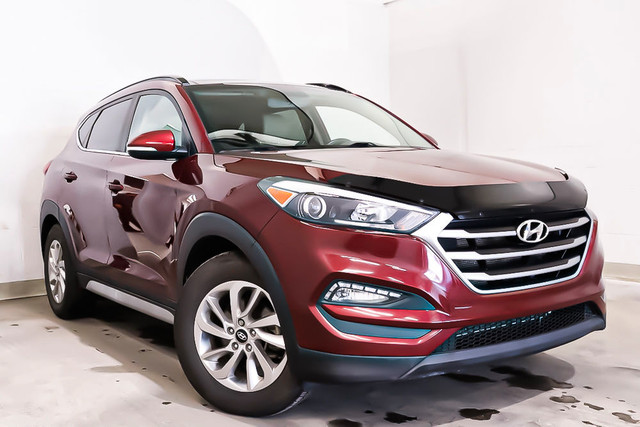 2017 Hyundai Tucson LUXURY + GPS + CUIR TOIT OUVRANT + SIEGES CH in Cars & Trucks in Laval / North Shore