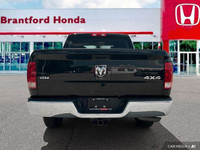 Command the road with this 2022 Ram 1500 Classic SLT Crew Cab Pickup, boasting a powerful 3.6L Penta... (image 4)