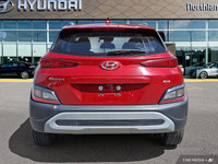 This 2022 Hyundai Kona Preferred SUV boasts a vibrant Pulse Red exterior and a sleek black interior.... (image 3)