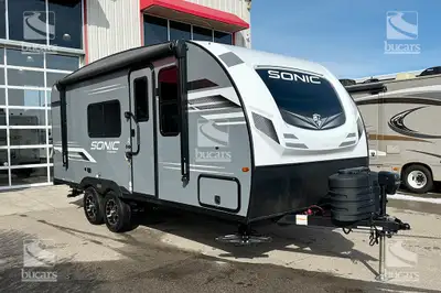 The 2024 Venture RV Sonic 190VRB is a sleek travel trailer in a striking Aztec grey fibreglass exter...