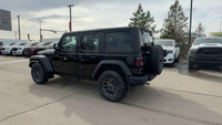 This 2025 JEEP WRANGLER 4-DOOR SPORT has the following options Cloth Low-Back Bucket Seats, Apple Ca... (image 6)