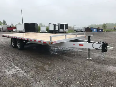 ACTION SERIES 102in. X 18' TANDEM AXLE ALUMINUM DECKOVER TRAILER! Unlock your hauling potential with...