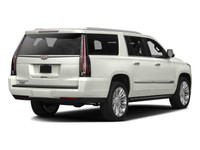 The 2016 Cadillac Escalade ESV Platinum in White combines robust 4×4 capabilities with luxurious dri... (image 1)