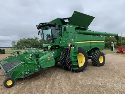 S780 COMBINE WITH 615P Brandt delivers Canada's #1 used equipment inventory for all the industries w...