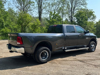 Tough, reliable, and built to handle anything you throw its way — this 2017 Ram 3500 SLT Dually with... (image 5)
