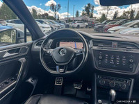 This Volkswagen Tiguan boasts a Intercooled Turbo Regular Unleaded I-4 2.0 L/121 engine powering thi... (image 8)