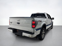 They say go big or go home! Our used 2013 Ford F-150 FX4 SuperCab 4X4 shown in Oxford White is one n... (image 4)