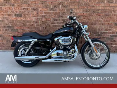 Canadian Sportster 1200 Custom with only 38,000 KM, spoke front wheel, classic Harley styling, 1200c...