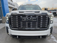 The 2025 GMC Sierra 3500HD Denali Ultimate in White Frost is a luxurious and powerful heavy-duty tru... (image 1)