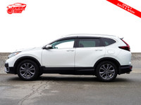 Check out this 2021 Honda CR-V Sport AWD with a sleek white exterior and luxurious black interior! W... (image 6)