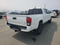 Recent Arrival! Odometer is 9163 kilometers below market average! 2023 Toyota Tacoma Ice Cap 4WD. 3.... (image 2)
