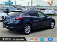 Just Arrived 2018 Mazda MAZDA3 i Touring AT 5-Door Blue has 102,283 KM on it. 2L 4 Cylinder Engine e... (image 3)