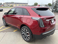 Stand out in Radiant Red Tintcoat with this premium 2023 Cadillac XT5 Sport AWD, blending luxury, pe... (image 3)