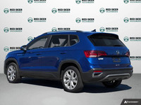 This 2022 Volkswagen Taos Comfortline is a practical and efficient compact SUV that offers smooth pe... (image 4)
