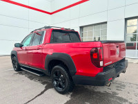 Our 2023 Honda Ridgeline Touring in Radiant Red Metallic is a local lease return! Call to book an ap... (image 2)