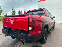 Our 2023 Honda Ridgeline Touring in Radiant Red Metallic is a local lease return! Call to book an ap... (image 6)