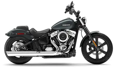 The Street Bob is a lean, mean bobber with mini-ape handlebars, mid-mounted foot controls, and a mas...