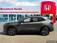 Experience the efficiency and versatility of this 2024 Ford Escape PHEV, boasting a powerful 2.5L At... (image 1)