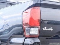 From work to weekends, this previous daily rental Black 2023 Toyota Tacoma muscles through any terra... (image 7)