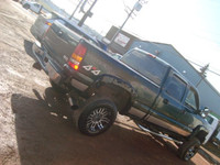 NORTH POINT MOTORS...CALL TEXT 780-224-7791 CHECK OUT THIS 03 GMC 2500HD 4X4 6.6L DURAMAX DIESEL. TR... (image 2)
