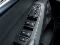 Experience the sleek and stylish 2023 Kia Seltos EX, a compact SUV perfect for navigating city stree... (image 8)