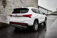This 2021 Hyundai Santa Fe is for sale today. This SUV has 96,231 kms. It's white in colour . It has... (image 2)